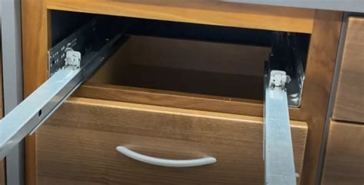 How do you fix a self closing drawer slide