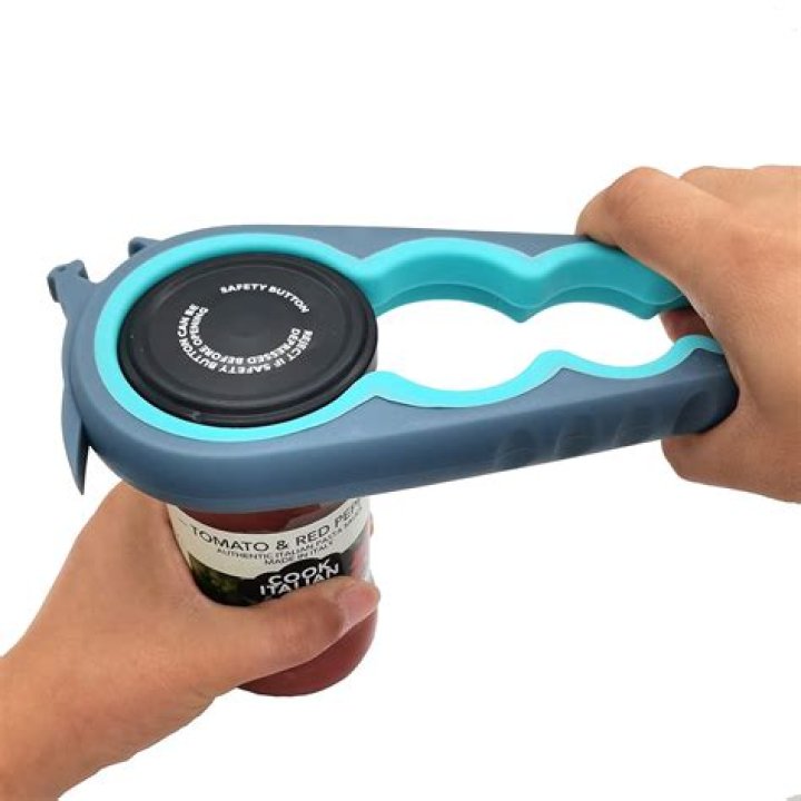 How do you open a can without a can opener with scissors?