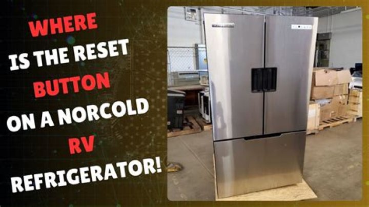 How do you reset a Norcold 2118 refrigerator?