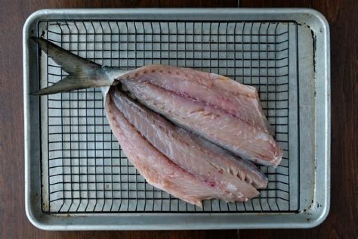 How do you wrap Bluefish filets in bacon?