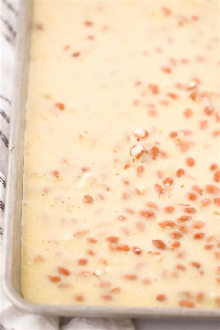 What does baking soda do in peanut brittle?